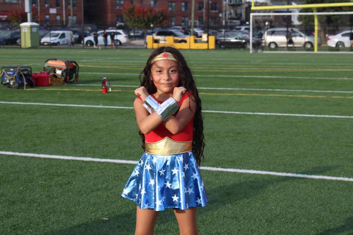 Kid Dressed up as Wonder Woman. 