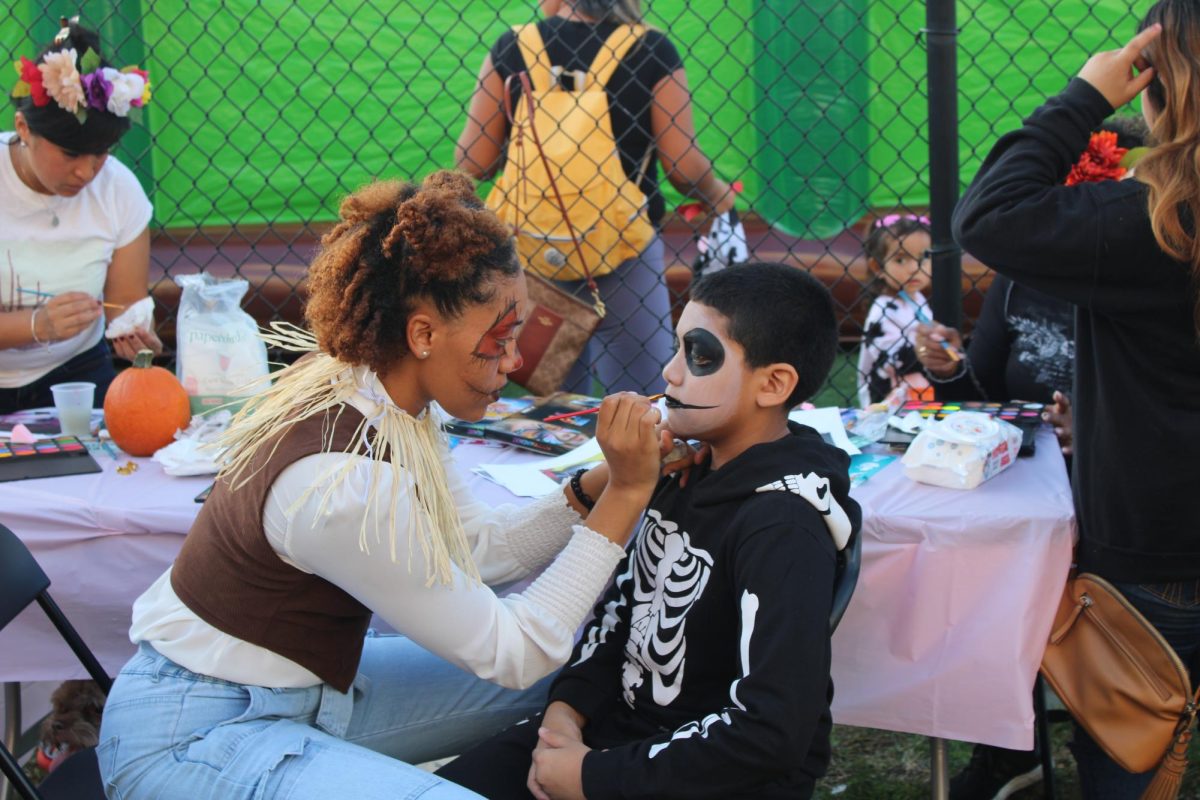 Face painting offered by the Recreation Department. 