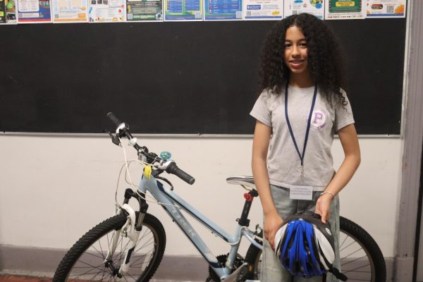 Prep 7th-grader Rachel Perez won a brand-new bike in a safety poster competition.